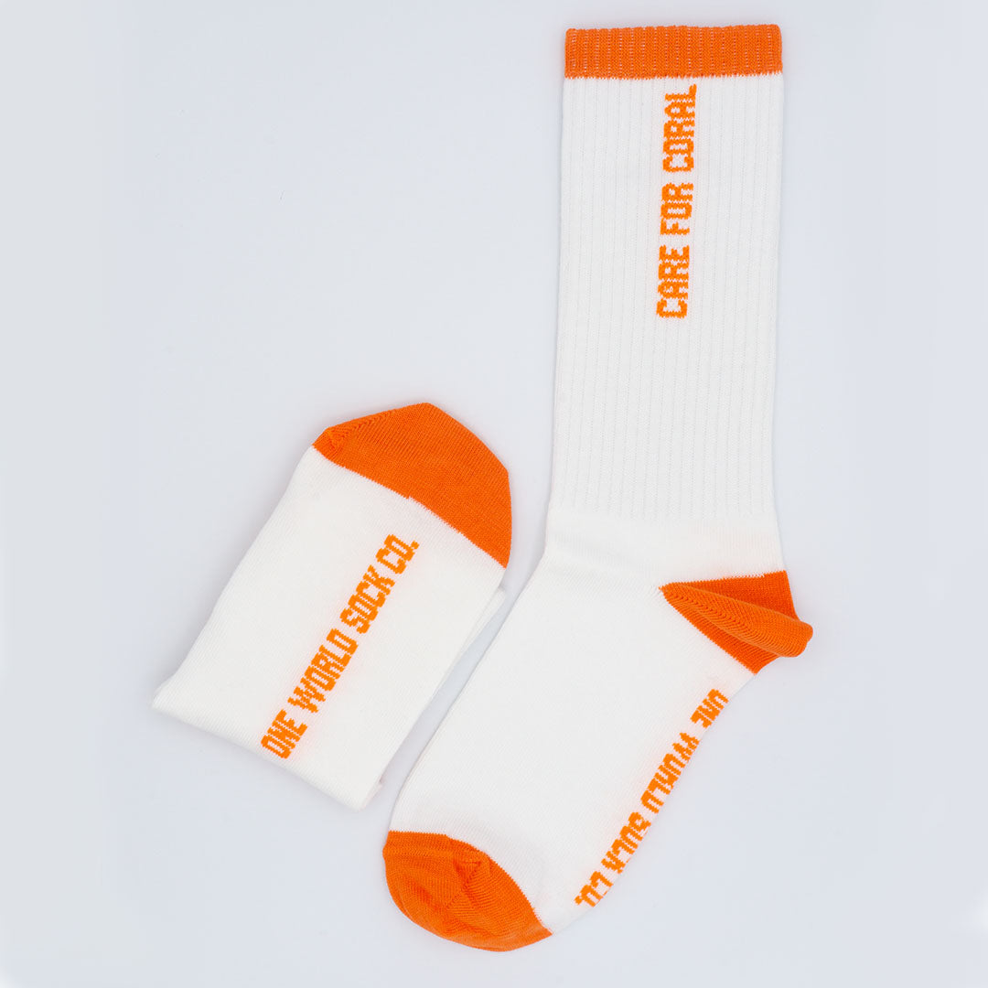 Orange & White Recycled cotton Sports Crew Socks.  Socks website. socks online Store. Mens socks. Sustainable clothing for him. Socks made from Recycled cotton. Colourful Socks for Girls. Colourful Socks for Men. Colourful Socks for women. Colourful Socks for boys.  Sustainable product. Sustainable socks. Gift ideas for women. Gift Ideas for Men. Gifts for music lovers. Gifts for musicians.