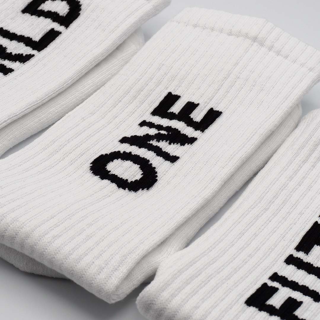 White Recycled cotton Sports Crew Socks. Socks website. socks online Store. Mens socks. Sustainable clothing for him. Socks made from Recycled cotton. Colourful Socks for Girls. Colourful Socks for Men. Colourful Socks for women. Colourful Socks for boys.  Sustainable product. Sustainable socks. Gift ideas for women. Gift Ideas for Men. Gifts for music lovers. Gifts for musicians.