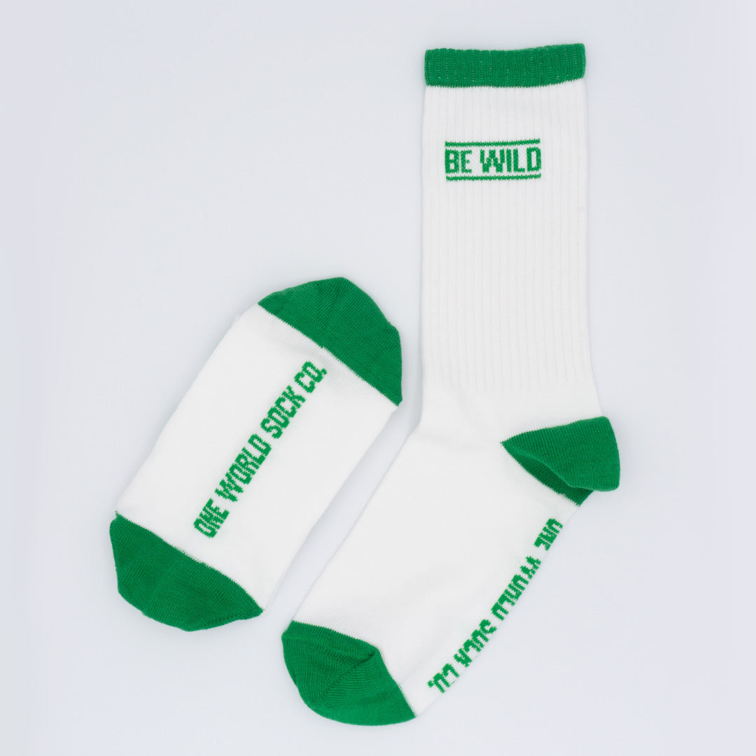 Green & White Recycled Cotton sports Crew Socks.  Socks website. socks online Store. Mens socks. Sustainable clothing for him. Socks made from Recycled cotton. Colourful Socks for Girls. Colourful Socks for Men. Colourful Socks for women. Colourful Socks for boys.  Sustainable product. Sustainable socks. Gift ideas for women. Gift Ideas for Men. Gifts for music lovers. Gifts for musicians.