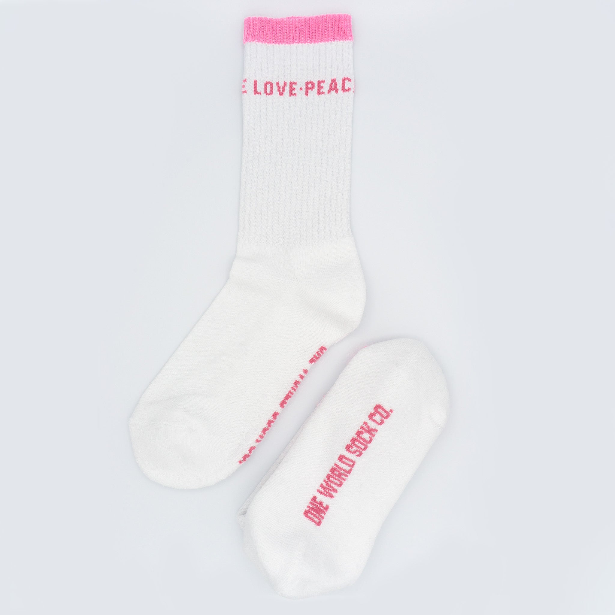 Pink & White Recycled cotton Sports Crew Socks.  Socks website. socks online Store. Mens socks. Sustainable clothing for him. Socks made from Recycled cotton. Colourful Socks for Girls. Colourful Socks for Men. Colourful Socks for women. Colourful Socks for boys.  Sustainable product. Sustainable socks. Gift ideas for women. Gift Ideas for Men. Gifts for music lovers. Gifts for musicians.