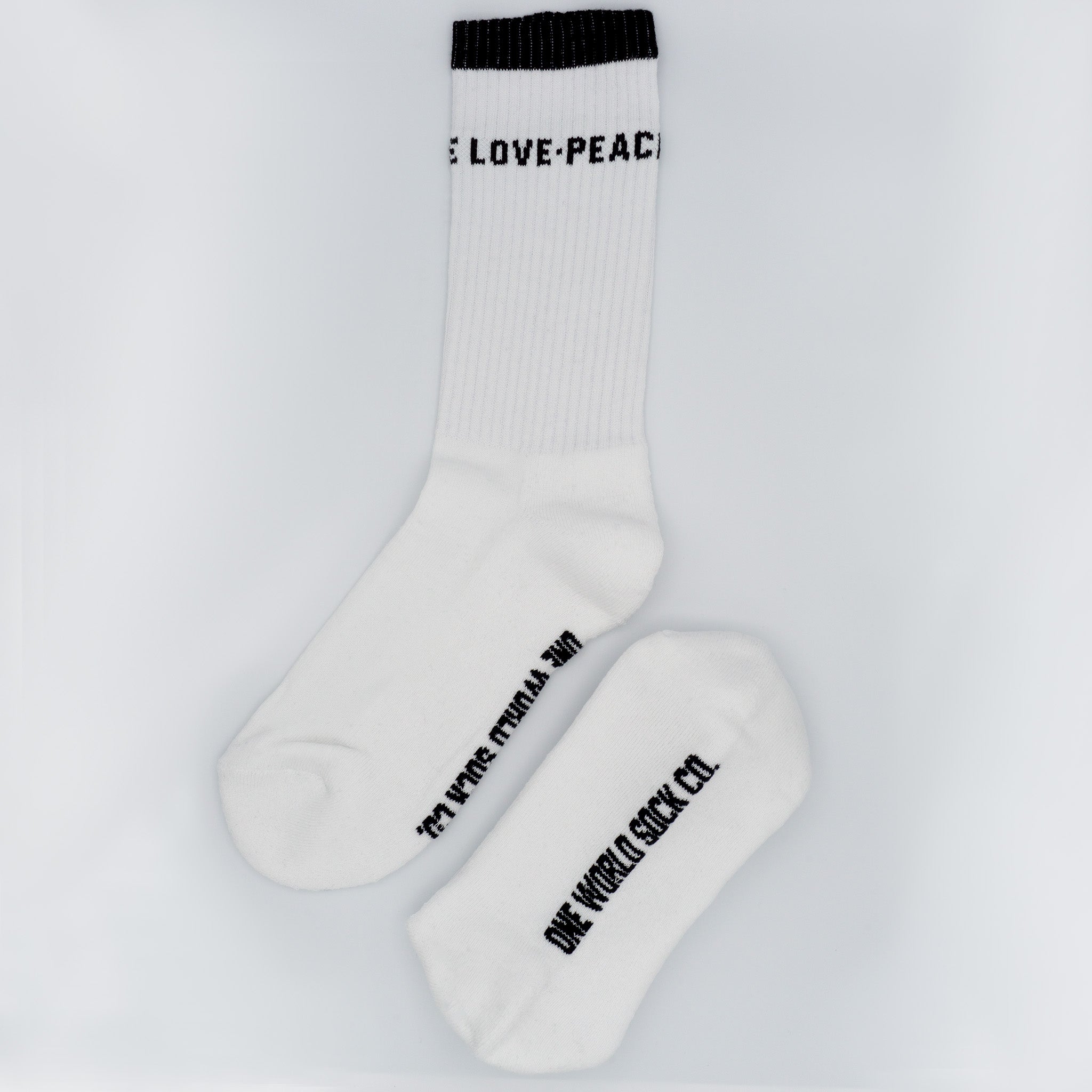 White Recycled cotton Sports Crew Socks. Socks website. socks online Store. Mens socks. Sustainable clothing for him. Socks made from Recycled cotton. Colourful Socks for Girls. Colourful Socks for Men. Colourful Socks for women. Colourful Socks for boys.  Sustainable product. Sustainable socks. Gift ideas for women. Gift Ideas for Men. Gifts for music lovers. Gifts for musicians.