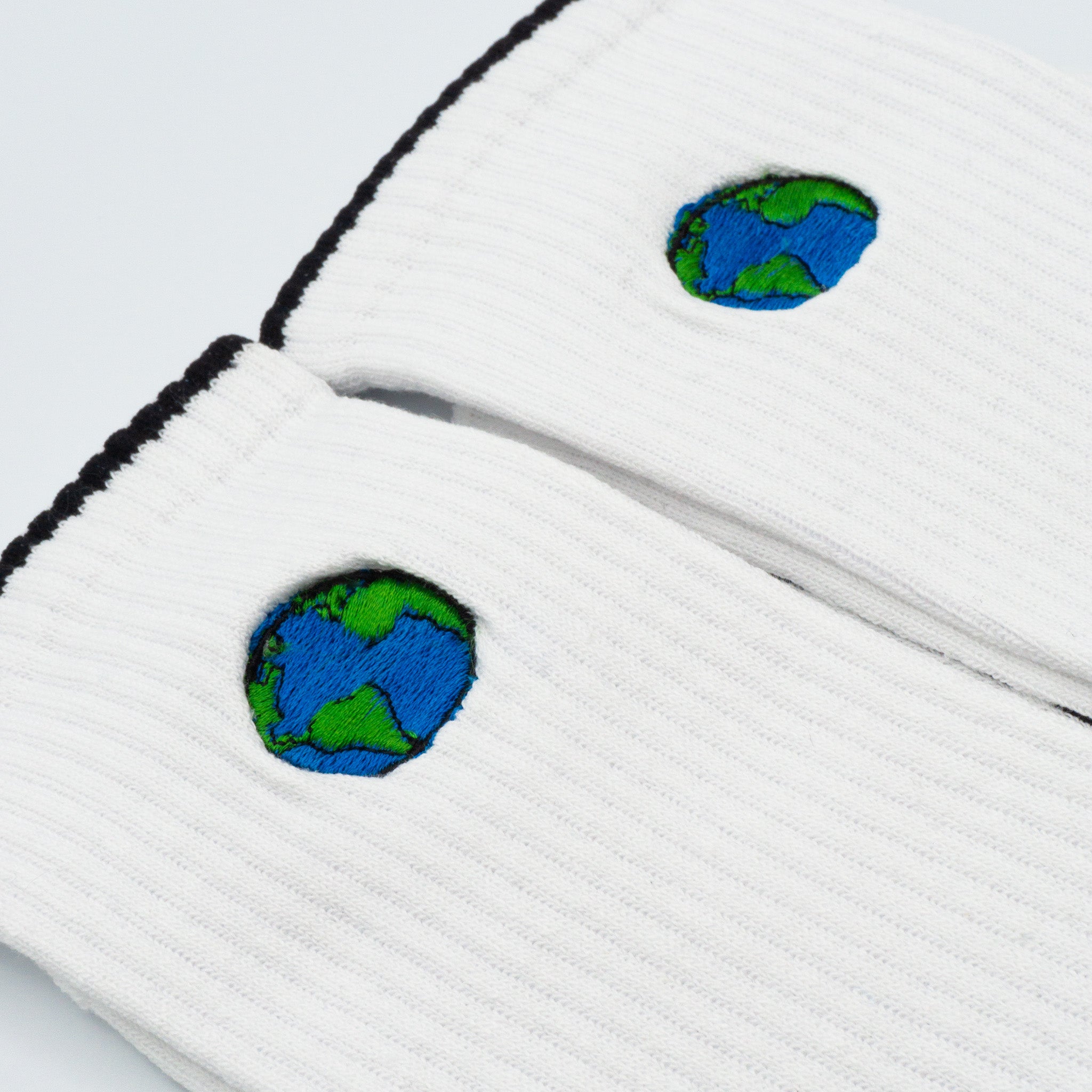 White Recycled cotton Sports Crew Socks. Socks website. socks online Store. Mens socks. Sustainable clothing for him. Socks made from Recycled cotton. Colourful Socks for Girls. Colourful Socks for Men. Colourful Socks for women. Colourful Socks for boys.  Sustainable product. Sustainable socks. Gift ideas for women. Gift Ideas for Men. Gifts for music lovers. Gifts for musicians.